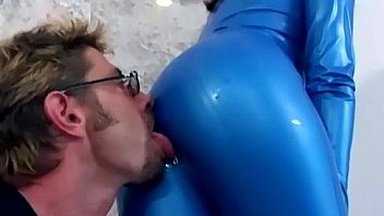 Brunette gives drooling blowjob in boots and latex